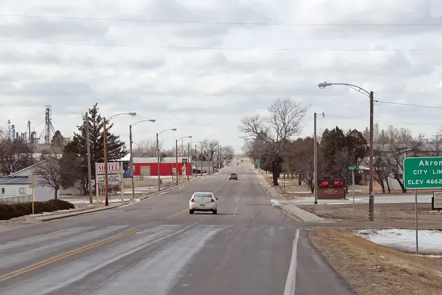 US 34 entering Akron past grain elevators and small-town storefronts