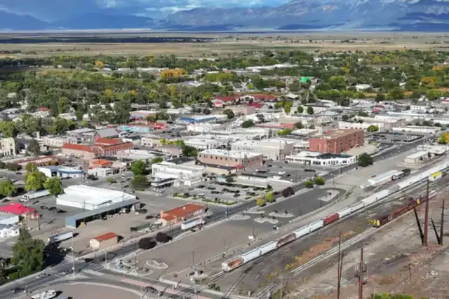 Downtown Alamosa and the rail yard with the Sangre de Cristo range behind