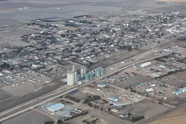 Aerial view of Cheyenne Wells with grain elevators beside the Union Pacific tracks