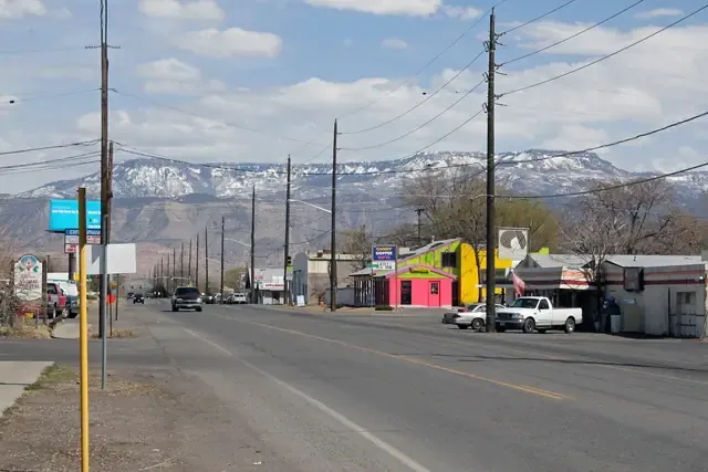 US 6 through Clifton with Grand Mesa in the distance