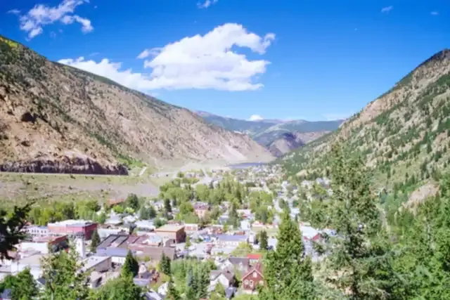 Georgetown's Victorian rooftops in the narrow Clear Creek valley below steep mountain slopes