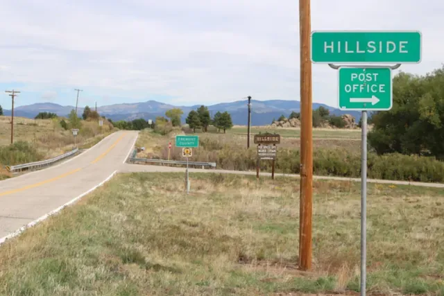 State Highway 69 at Hillside with pastures and the Sangre de Cristo foothills