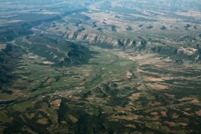 Aerial view of the Mancos Valley with mesas and farmland
