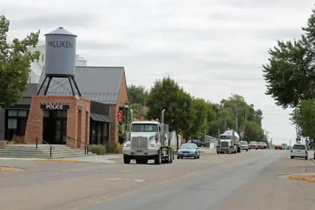 Milliken's main street with the town water tower and brick buildings