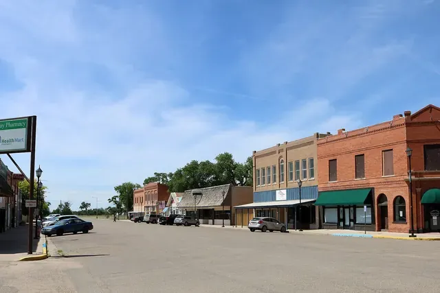 Brick storefronts along Main Street in Ordway on a sunny day
