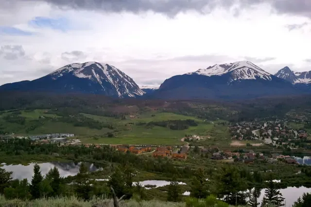 Silverthorne neighborhoods and ponds below the snowy Gore Range