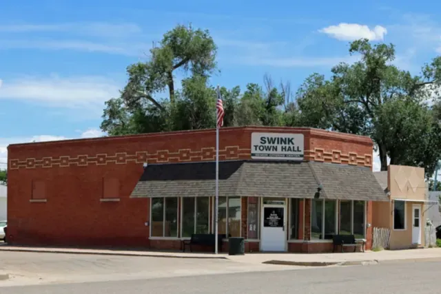 The brick Swink town hall at Third and Columbia